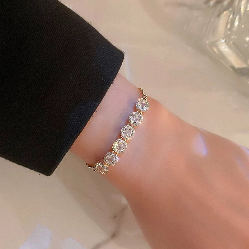 Justerbart lyxigt armband med guldzirconia